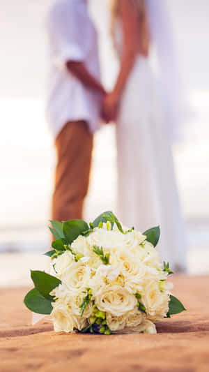 Wedding Couple Roses On Sand Wallpaper