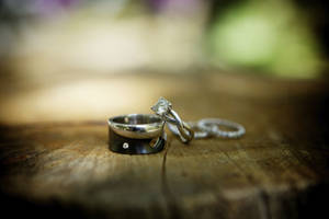 Wedding Rings On Wood Wallpaper