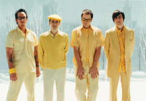 Weezer Bandin Yellow Outfits Winter Backdrop Wallpaper