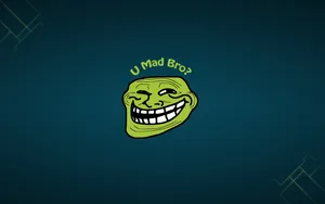 Whimsical Green Meme Face On A Blue Background Wallpaper