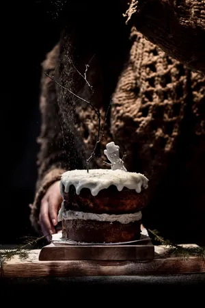 Whimsical Snowman Cake Decoration Wallpaper