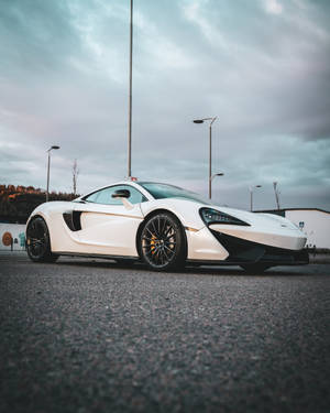 White Bugatti On Cloudy Day Wallpaper