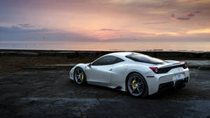 White Ferrari Under Pink Skies Wallpaper