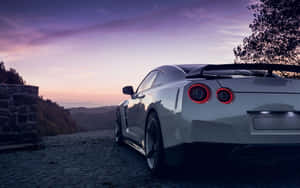 White Gt-r Desktop Overlooking Sunset Wallpaper