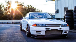 White Jdm Car With Sunset Rays Wallpaper