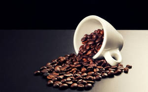 White Mug Spilling Coffee Beans Wallpaper