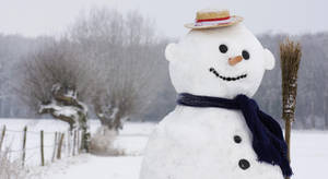 White Snowman With Scarf Wallpaper