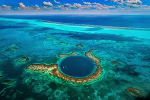 Wide Seascape Shot Of Great Blue Hole Wallpaper