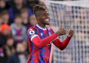 Wilfried Zaha Doing Thumbs Up Wallpaper