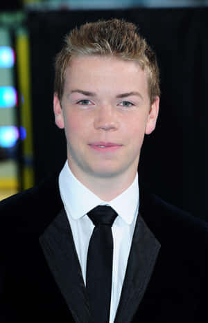 Will Poulter Red Carpet Portrait Wallpaper