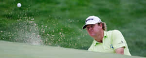 William Mcgirt Hitting A Golf Ball Wallpaper