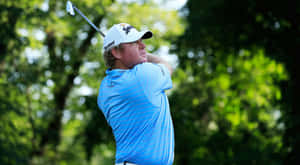William Mcgirt With A Club Overhead Wallpaper