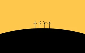 Wind Turbines On A Hill With A Yellow Background Wallpaper