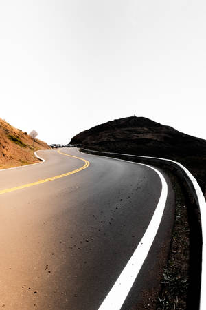 Winding Road Beside The Cliff Wallpaper