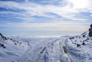 Winter Landscape Snowy Road Cloudy Sky Wallpaper