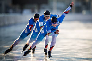 Winter Olympics Ice Skate Racers Wallpaper