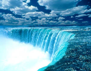 Witness The Vibrant And Powerful Beauty Of Niagara Falls Wallpaper