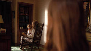 Woman And Annabelle Cursed Doll Wallpaper