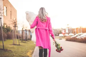 Woman Holding Rose Aesthetic Phone Wallpaper