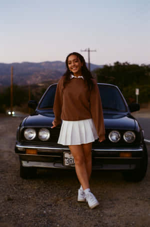 Woman Wearing White Pleated Miniskirt Wallpaper