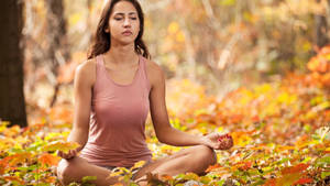 Woman Yoga In Autumn Wallpaper