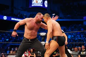 Wrestler Minoru Suzuki Fighting Jon Moxley Wallpaper