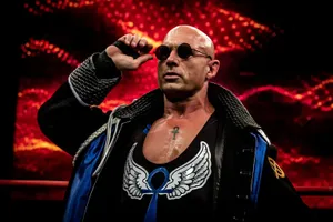Wrestler_with_ Sunglasses_and_ Jacket Wallpaper