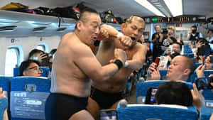Wrestlers Clashon Train Wallpaper