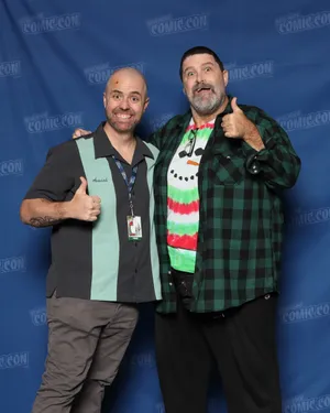 Wrestling Legend Mick Foley With Brendan M. Allen At Comicon Wallpaper