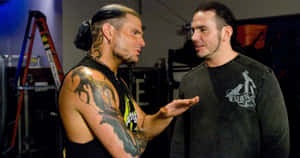 Wrestling Legends Matt Hardy And Jeff Hardy In Action Wallpaper