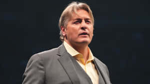 Wwe's Finest - William Regal In Elegant Gray Suit Wallpaper