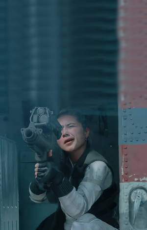 Yelena Belova With Grenade Launcher Wallpaper