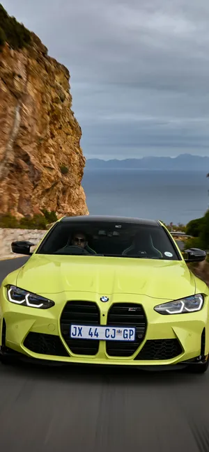 Yellow Bmw M In A Hillside Road Wallpaper