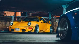 Yellow R W B Porsche Night Scene Wallpaper