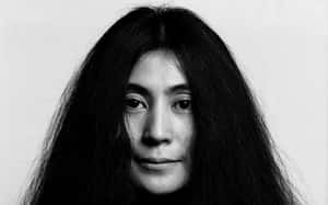 Yoko Ono, Iconic Artist And Activist, With Her Signature Long Hair Wallpaper