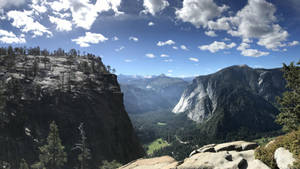 Yosemite Valley And Cloudy Sky Wallpaper