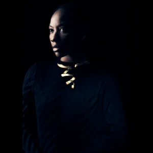 Young Black Woman Split Light Effect Wallpaper