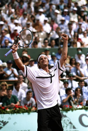 Young Carlos Moya Celebrating Wallpaper