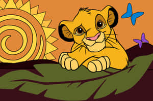 Young Lion Cub Sunrise Scene Wallpaper