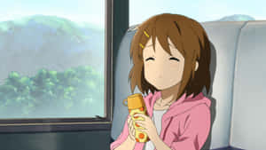 Yui Hirasawa Playing Guitar On Stage Wallpaper