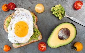 Yummy Avocado Fruit Sandwich Spread With Egg Wallpaper