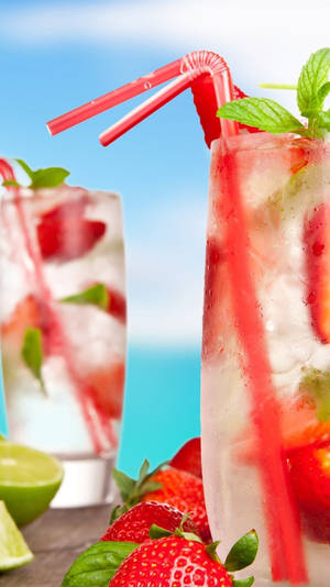 Zesty Strawberry Tom Collins Tropical Drink Wallpaper