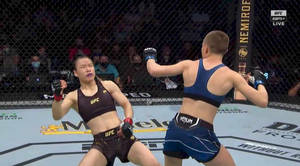 Zhang Weili Avoiding Rose Namajunas Punch Wallpaper