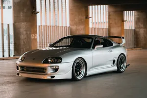 Zoom Past In Style With A Toyota Supra Wallpaper